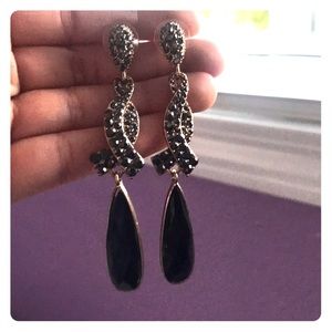 Beautiful long black, studded earrings.